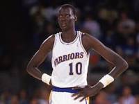 How tall is Manute Bol?